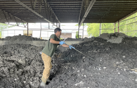 Anthony Drouin, residuals management supervisor, collects samples of sludge on June 10. He'll test them for PFAS. Wastewater plants get their sludge tested a few times a year, depending on their size.