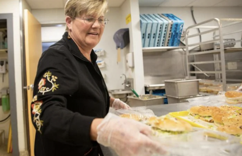 The Community Kitchen in Keene dishing out prepared meals.
