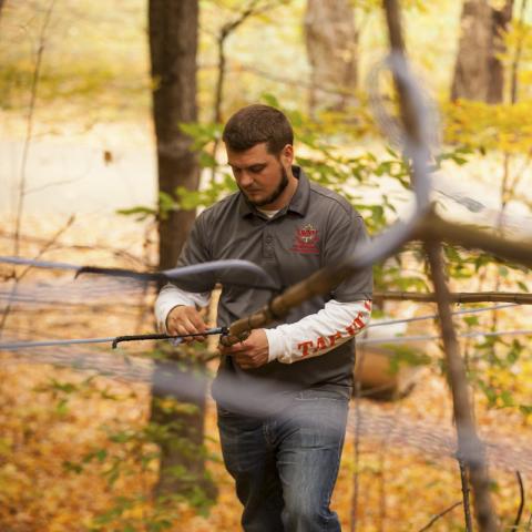 man working in the woods